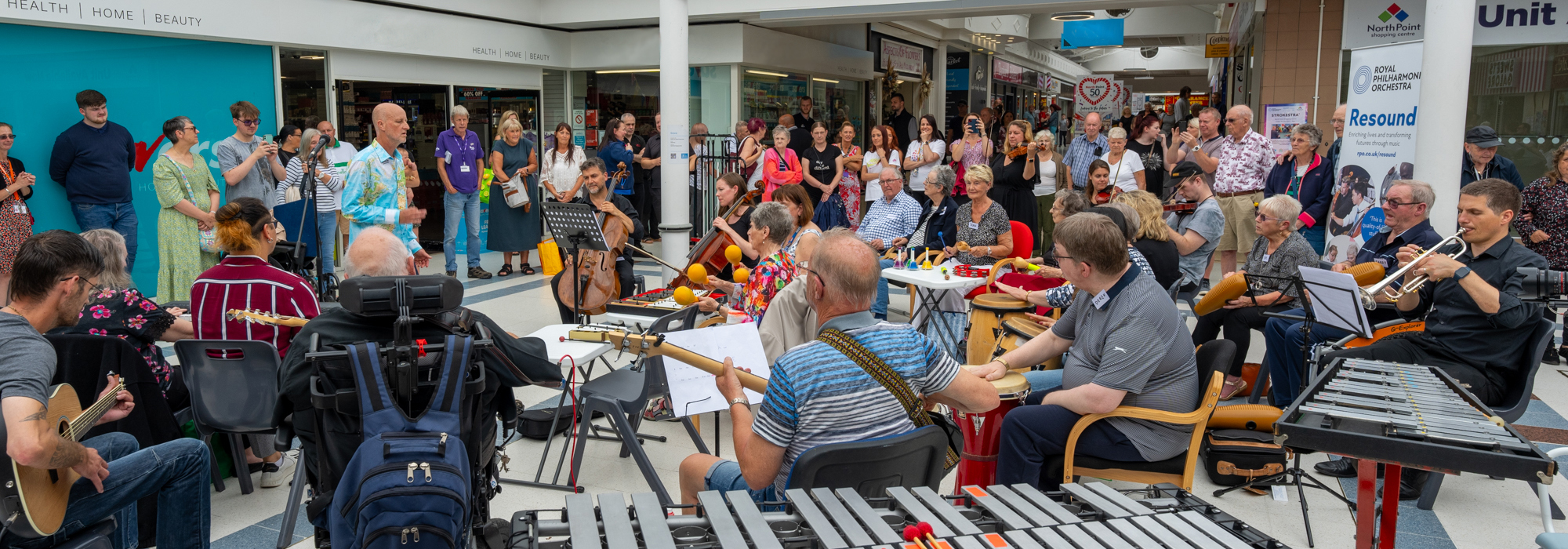 A STROKESTRA performance in North Point shopping centre in Hull, with an orchestra made up on stroke patients, carers and RPO musicians playing to a surrounding crowd