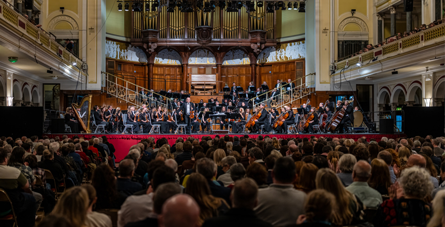 The RPO in Hull City Hall, with the Leader standing for applause