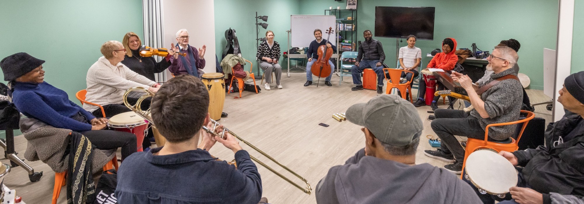 Group music making and smiles all around